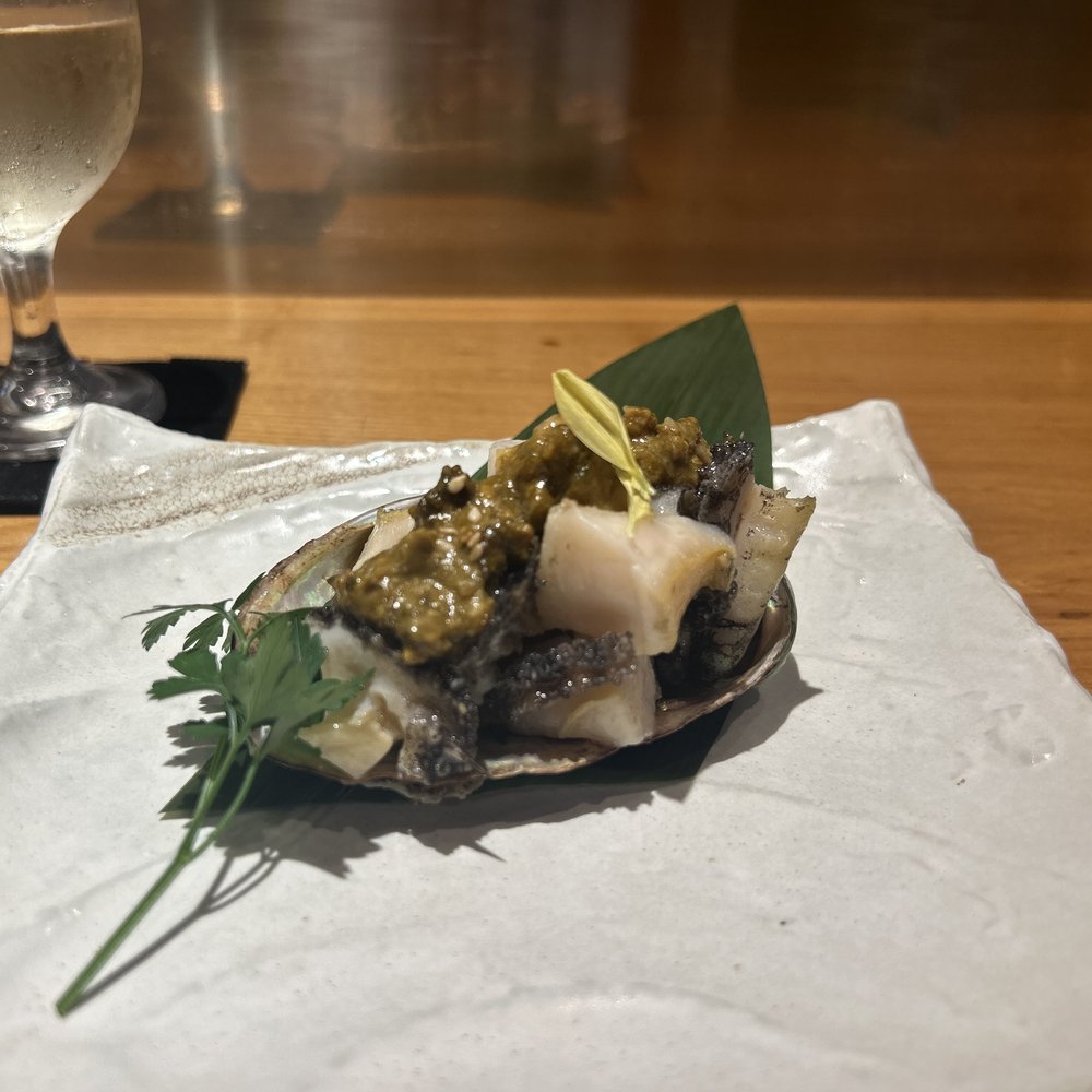 Abalone grilled in its shell